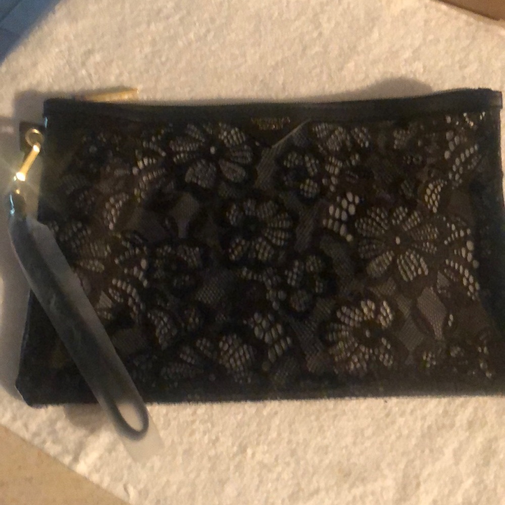 New Victoria’s Secret cosmetics bag. 11 1/4 x 8.  Black lace.